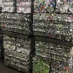 Stacks of compressed aluminum cans for recycling