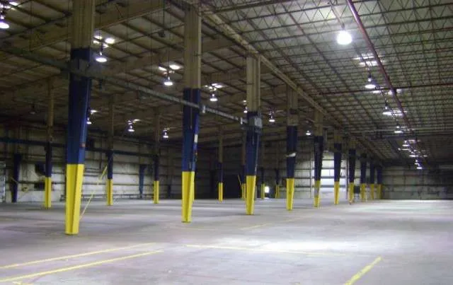 Industrial warehouse interior used for recycling and waste stream processing