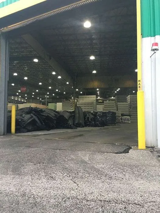 Recovered materials stacked and sorted inside a processing warehouse