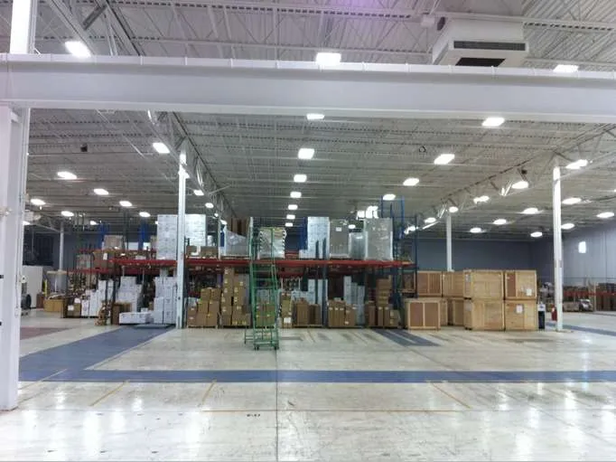Warehouse with boxes and storage shelves